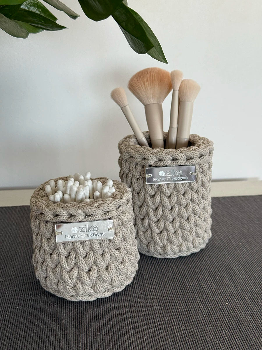 Mini Little Loop basket next to the larger Little Loop basket in beige shade, showcasing sizes for custom home storage.