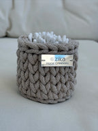 Mini Little Loop handmade recycled cotton basket in beige holding cotton buds by Zika Home Creations